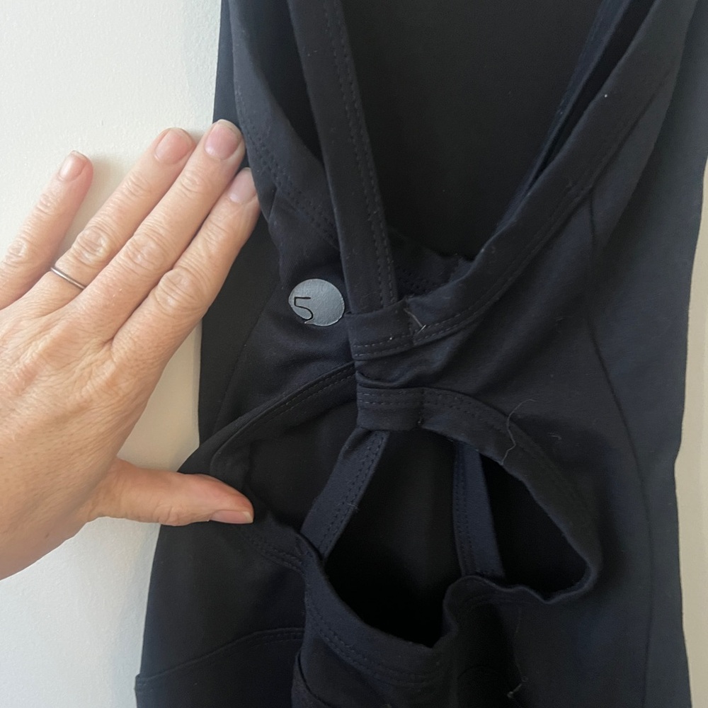 Black Sleeveless Top with Cutout Design